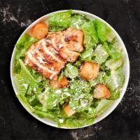 Crispy Chicken Caesar Salad · Romaine lettuce, croutons, a touch of parmigiana cheese, and crispy chicken.