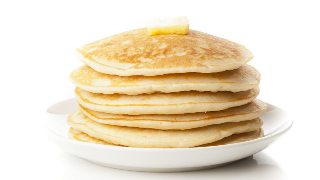 Pancakes · Fresh made pancakes served with a side of syrup and butter.