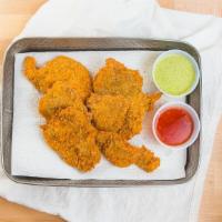 Panko-Breaded Pork Chops · Pork chops lightly battered in panko bread crumbs w. Choice of one complimentary housemade s...
