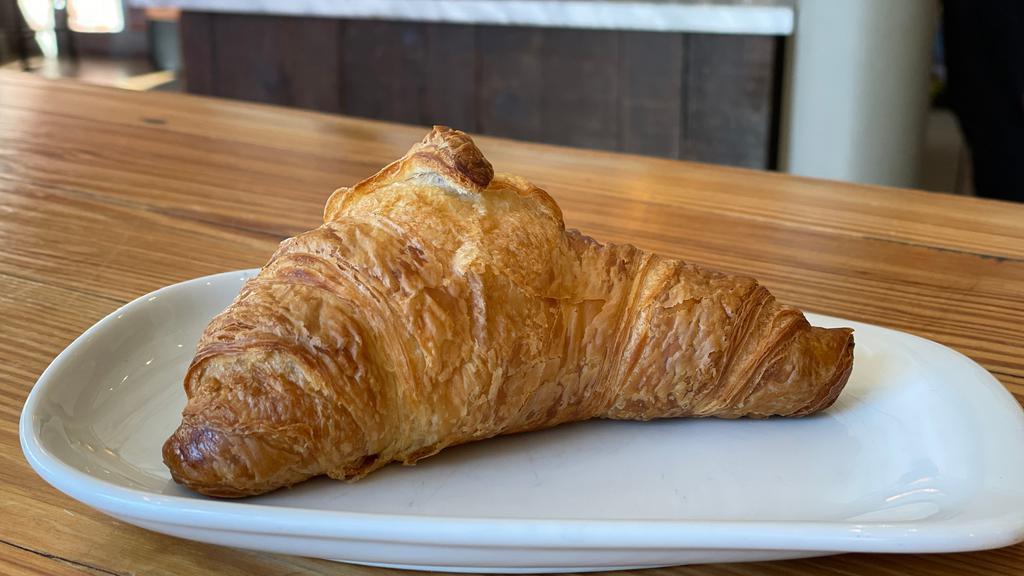 Plain Croissant · French buttery croissant.  Crisp and flaky.