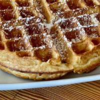 Belgium Waffle · Freshly made crisp and fluffy Belgium Waffle with powdered sugar and syrup.  This item is no...