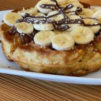 Banana Nutella Waffle · Freshly made crisp and fluffy Belgium waffle with banana and Nutella.  This item is not avai...