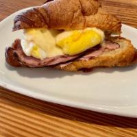 Ham, Egg And Swiss Croissant · All butter croissant with baked egg, ham and Swiss cheese.  This item is not available for o...