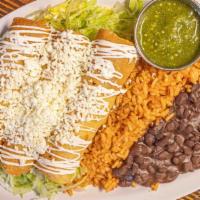 Tacos Dorados De Pollo · Fried corn tortillas filled with shredded chicken topped with lettuce, sour cream, and queso...
