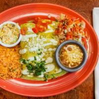 Enchiladas Sonoma Dinner · Two flour tortillas filled with Cheddar cheese, grilled chicken and spinach. Topped with a c...