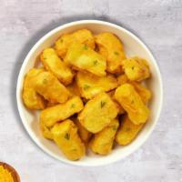 Golden Paneer · Deep fried cheese cubes marinated flitter with gram flour and Indian spices deep fried.