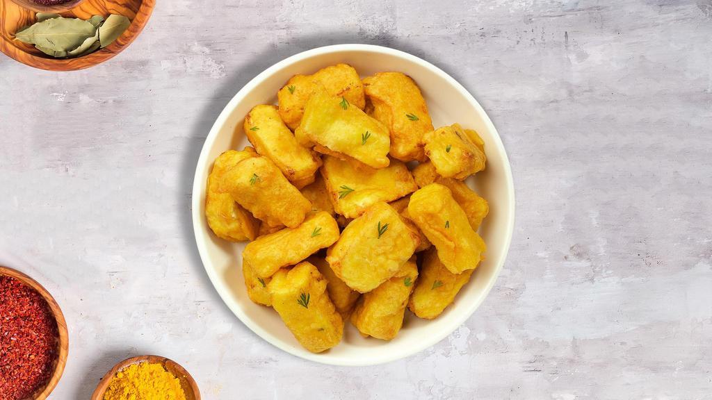 Golden Paneer · Deep fried cheese cubes marinated flitter with gram flour and Indian spices deep fried.