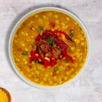 Day For The Dal Tarka (Yellow) · Yellow lentils sauteed with ginger, garlic, onion, tomato, and Indian spices.