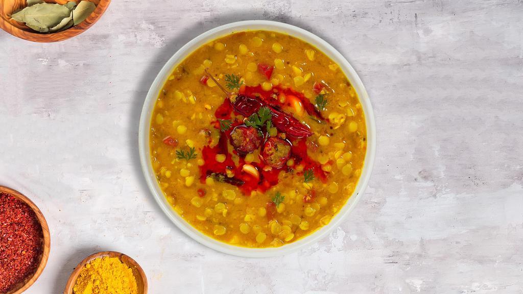 Day For The Dal Tarka (Yellow) · Yellow lentils sauteed with ginger, garlic, onion, tomato, and Indian spices.