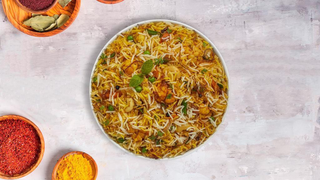 Very Veggie Biryani · Spiced seasoned vegetables cooked with Indian spices and basmati rice.