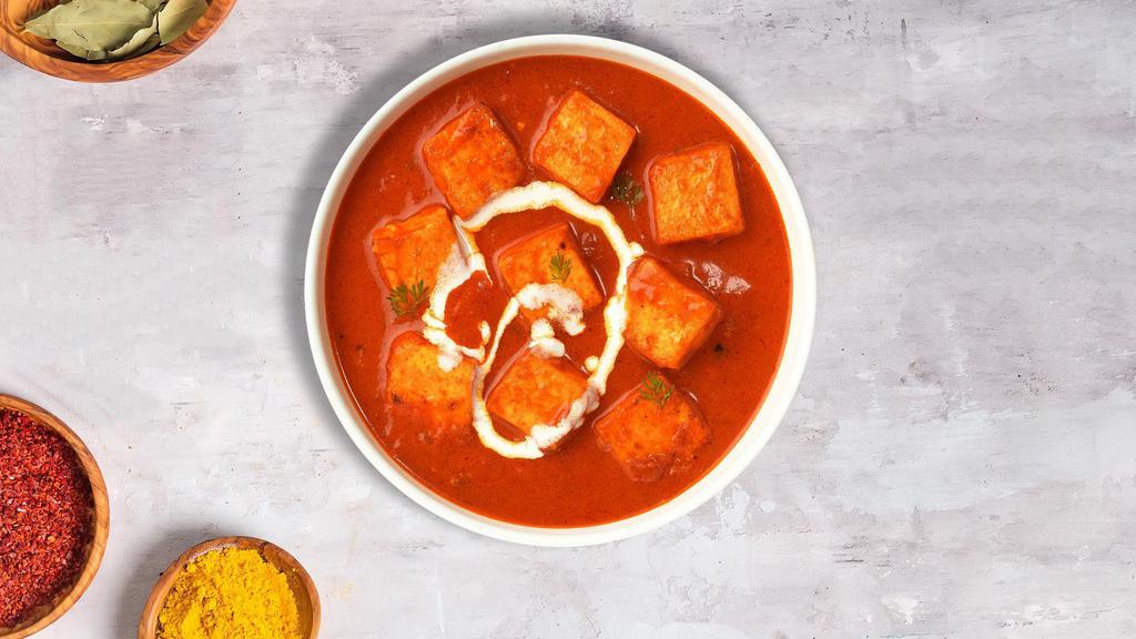 Butter Buzzer Paneer Masala · Cheese cubes in creamy tomato sauce with Indian spices.