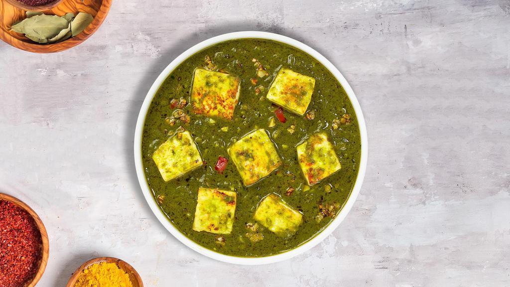 Palak Paneer · Cheese cubes cooked with fresh spinach and Indian spices.