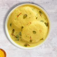 Rasmalai Rescue · Soft cottage cheese balls flavored with cardamom and saffron served in chilled creamy milk.