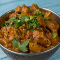 Chicken Curry · Boneless chicken cooked in a spicy flavored sauce.