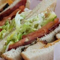 Grilled Chicken Club · Served with cheese, lettuce, tomatoes, bacon, and mayo. Served on sliced bread; white or whe...