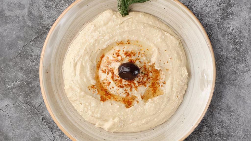 Hummus · Most popular. Mashed chick peas made into a paste with lemon juice and flavored with tahini.