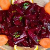 Beet Salad · Boiled Beets tossed with garlic and fresh mint lemon juice and olive oil vinegar