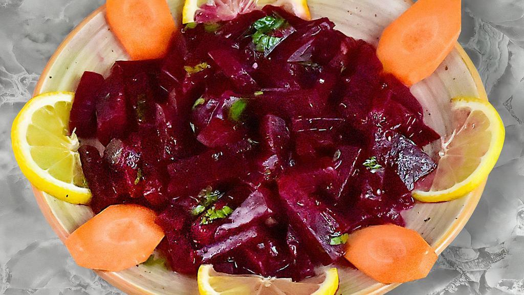 Beet Salad · Boiled Beets tossed with garlic and fresh mint lemon juice and olive oil vinegar