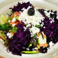 Kestane Salad · Sliced tomatoes, lettuce, red cabbage, carrots and cucumbers topped with shredded Feta chees...