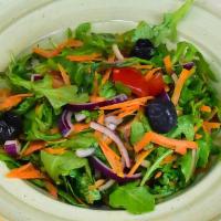 Arugula Salad · Fresh arugula, ripe tomato, red onion, and shredded carrots topped with olive oil, lemon jui...