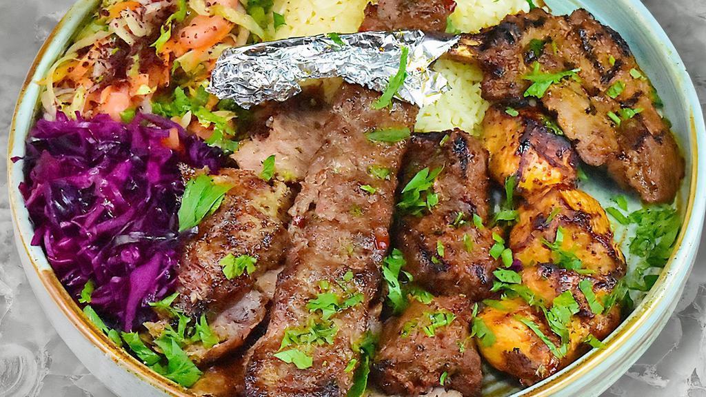 Mixed Grill · Your choice of lamb or chicken gyro, chicken shish kebab, adana kebab, lamb shish kebab and lamb chops. Served with rice, peppers and onions, lettuce and a side of red and white sauces.