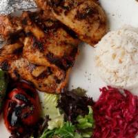 Chicken Chops · Marinated chicken thighs grilled on char-grill. Served with rice mixed salad, marinated red ...