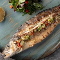 Grilled Branzini · Whole branzini served with choice of mixed green salad or rice.