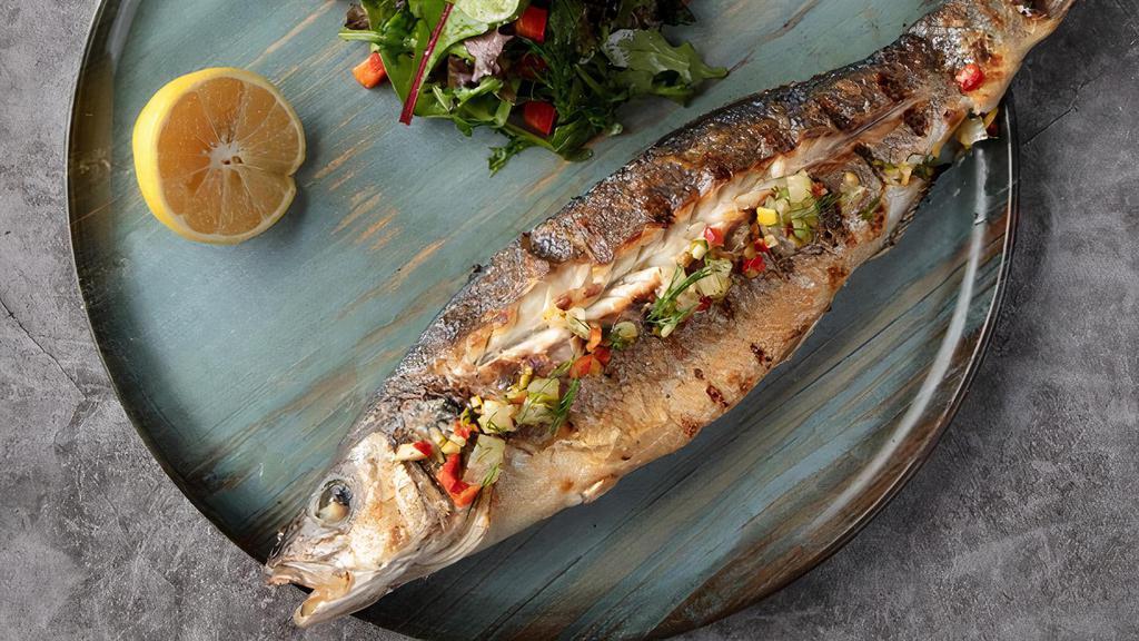 Grilled Branzini · Whole branzini served with choice of mixed green salad or rice.