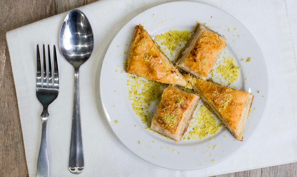 Baklava · Most popular. Sweet pastry made of extremely thin sheets of filo dough layered with chopped nuts and honey syrup.