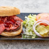 Pastrami Burger  · 8 oz. ground beef cooked & topped with sizzling grilled pastrami.