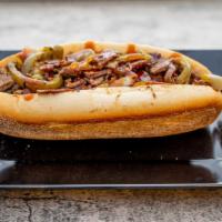 Philly Steak Sub · Thinly sliced steak served with fried onions and pepper.