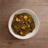 Chicken Saag · Chicken and spinach with garlic and fresh spices.