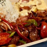 Chopped Steak (Regular) · Top sirloin sauté with onions, garlic, bell peppers, and tomatoes in our secret sauce.  Serv...