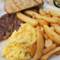 Steak And Eggs · Grilled sirloin steak with two eggs, home fries and toast.