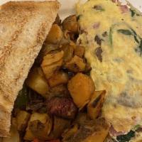 Imagination Omelet · Let your imagination run wild and add any fillings to your omelet. Served with toast.