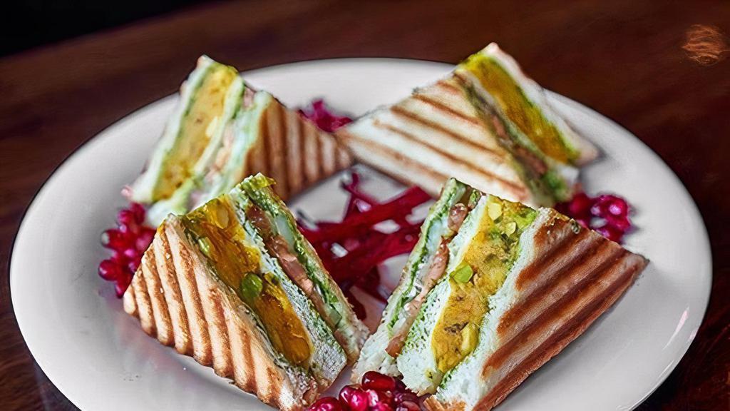 Vegetarian Masala Grilled Sandwich · Spices and vegetables.