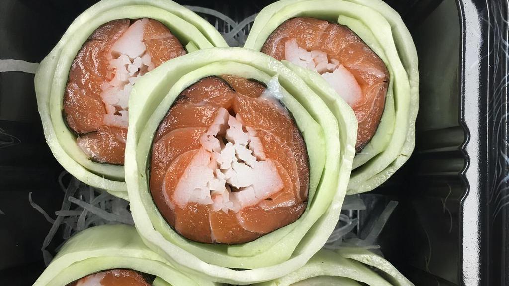 Salmon Naruto · Salmon and crab rolled in cucumber with seaweed.