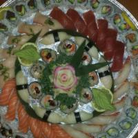 Platter C · 30 pieces of assorted sushi, California rolls (6 pieces), spicy tuna rolls (6 pieces), eel c...