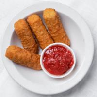 Mozzarella Sticks · Mozzarella sticks served with marinara sauce.