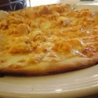 White Pizza Slice · A sauceless pie topped with ricotta. Mozzarella, and Parmesan cheese.