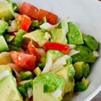 Avocado Salad · Sliced avocados, tomatoes, onions, jalapeños, lime. served with two injera rolls.