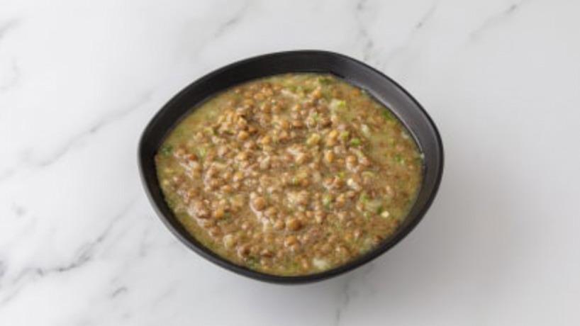 Azifa · Brown lentil salad made with spicy african mustard seed, onions, jalepeno and lime.