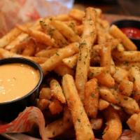 Parmesan Truffle Fries · Topped with truffle oil, garlic, chopped parsley, parmesan. cheese, and served with spicy ma...