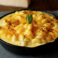 Mac & Melted Cheese · Cooked macaroni with jack&cheddar cheese, Asiago. smoked gouda and cream.