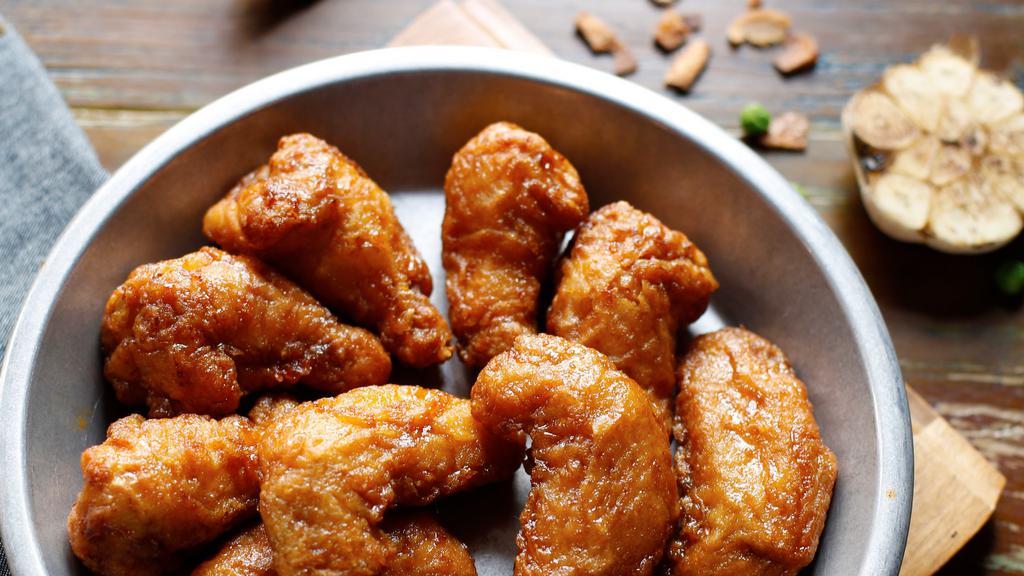  Signature Wings · Our signature chicken is fried with our special technique. giving it an amazing crunch. Our sauces are always brushed on. by hand.