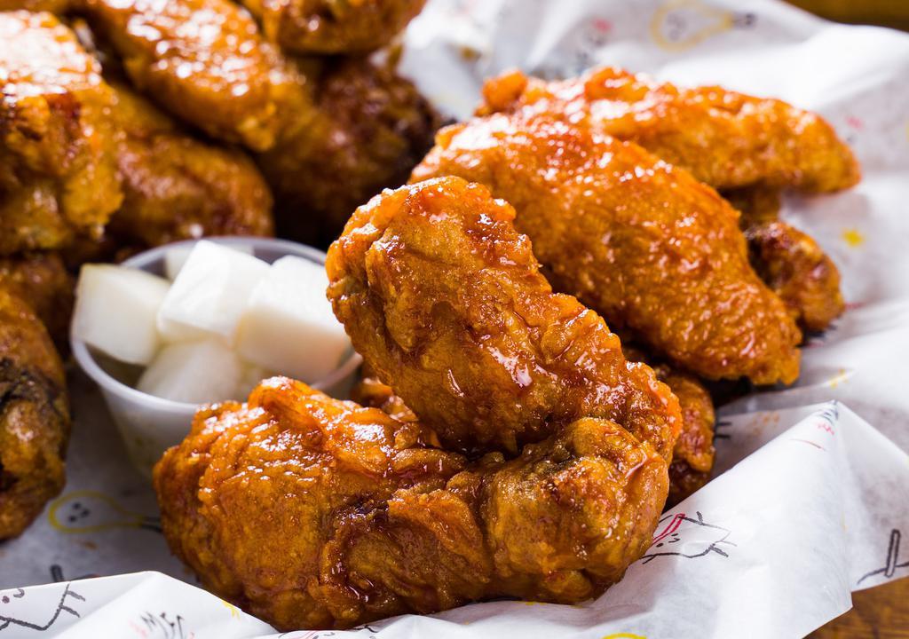 Wings & Drumsticks · Our signature chicken is fried with our special technique. giving it an amazing crunch. Our sauces are always brushed on. by hand.