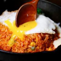 Kimchi Fried Rice · Pan-fried white rice with kimchi, ham, vegetables, and sunny side egg.