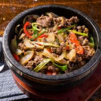  Bulgogi Over Rice · Steamed white rice topped with thinly sliced marinated. beef rib-eye and vegetables