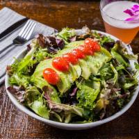 Avocado Salad · Avocado with mixed green, Parmesan cheese, Grape tomato, Olive. oil and Sesame ginger dressi...