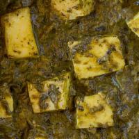 Saag Paneer Lunch · Rice spinach puree with ginger, garlic, and tomatoes.